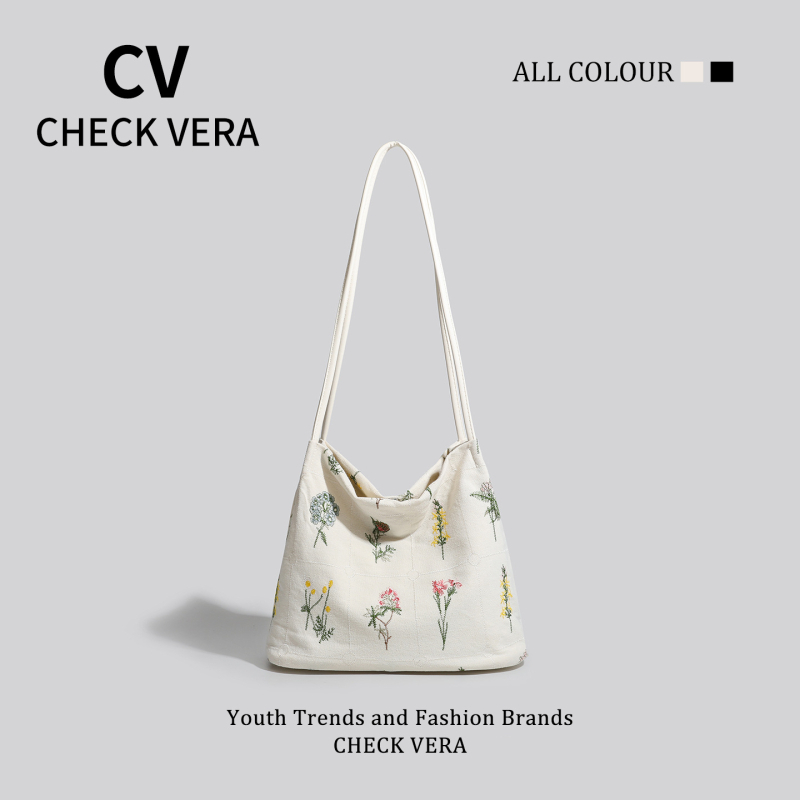 Torbica bucket tote od platna s crossbody remenom i skrivenim džepom na zip