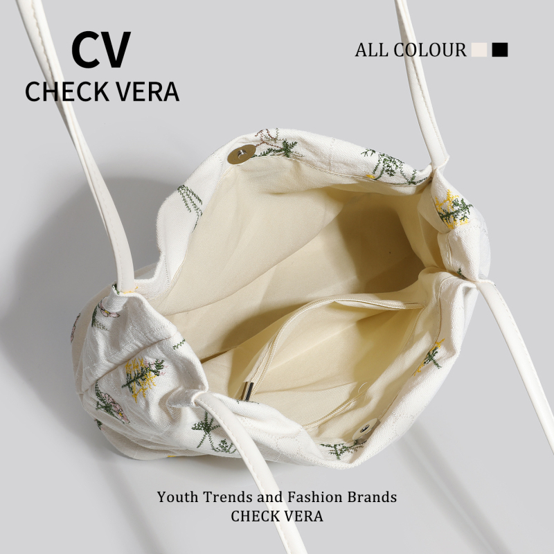 Torbica bucket tote od platna s crossbody remenom i skrivenim džepom na zip