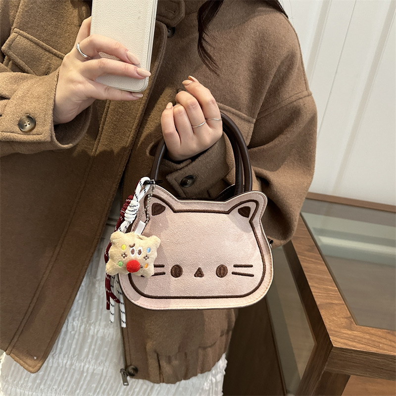 Slatka mačja sedlasta torba – mini crossbody torba za jesen-zimu 2025