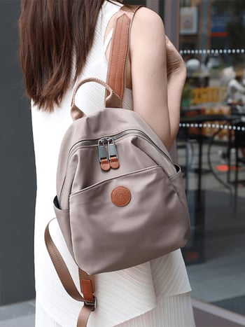 Ghiozdan pentru utilizare zilnică — impermeabil, material Oxford, închidere cu fermoar, design tridimensional, buzunare interioare: buzunar cu fermoar, buzunar pentru telefon, buzunar pentru ID