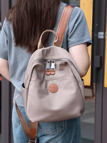 Ghiozdan pentru utilizare zilnică — impermeabil, material Oxford, închidere cu fermoar, design tridimensional, buzunare interioare: buzunar cu fermoar, buzunar pentru telefon, buzunar pentru ID