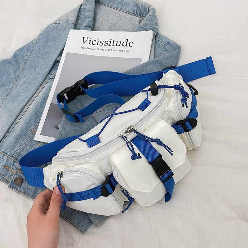 Nylonból készült crossbody táska, telefontartó zsebbel, cipzáras nyitás és egyetlen vállpánttal