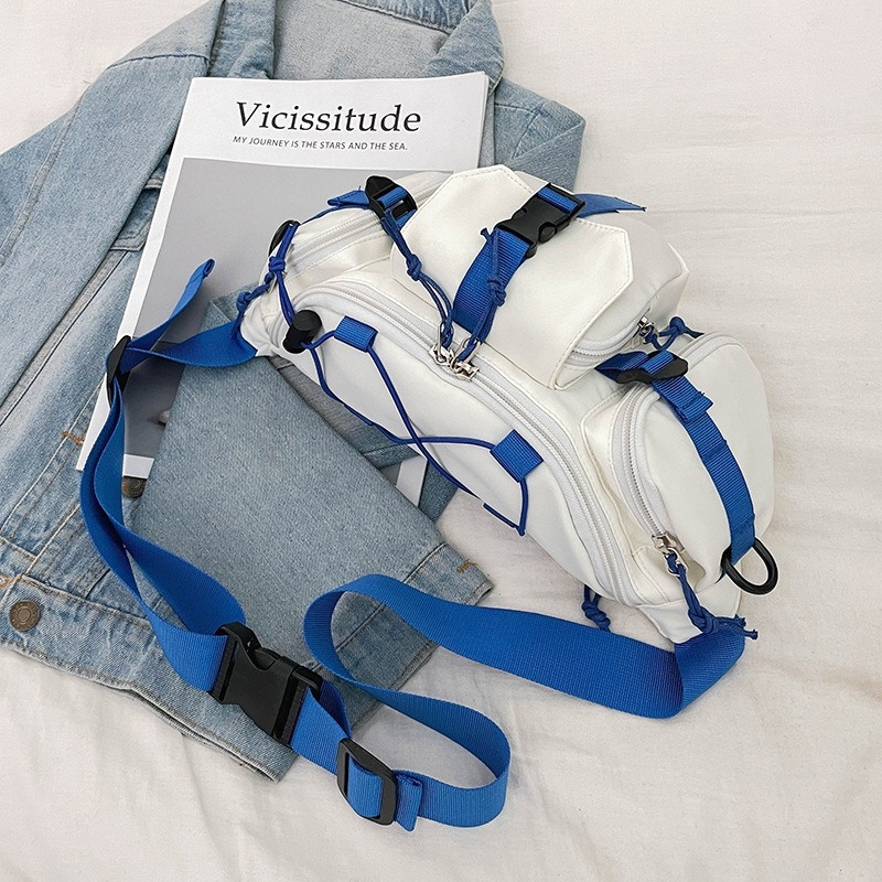 Nylonból készült crossbody táska, telefontartó zsebbel, cipzáras nyitás és egyetlen vállpánttal