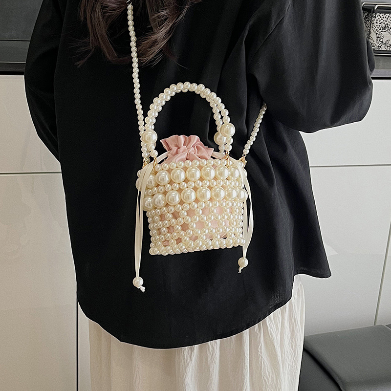 HAONNA bucket bag, gradski minimalistički stil, perlatni materijal, zatvaranje špagom