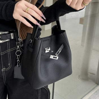 Lychee uzor bucket torba, prava koža (prvi sloj goveđe kože), zaključavanje, unutarnja džep s zipom i džep za dokumente, gradski stil jednostavnost, zimsko izdanje 2025