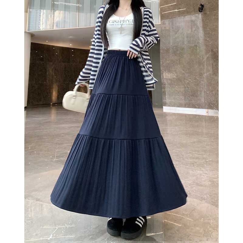 A-line vlnená sukňa, sukňa typu dážnik, vysoký pás, dlhá, textúra s vráskami, zima 2025, elegantný pracovný štýl