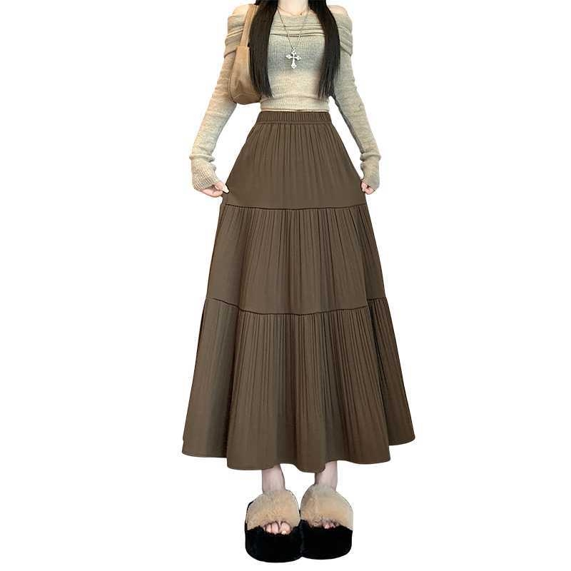 A-line vlnená sukňa, sukňa typu dážnik, vysoký pás, dlhá, textúra s vráskami, zima 2025, elegantný pracovný štýl