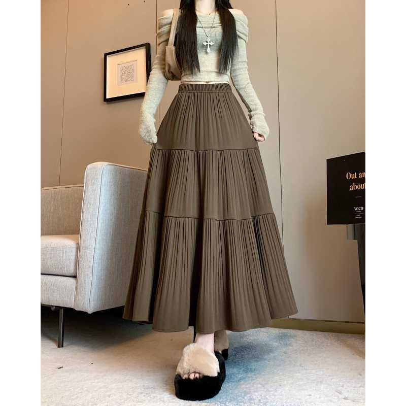 A-line vlnená sukňa, sukňa typu dážnik, vysoký pás, dlhá, textúra s vráskami, zima 2025, elegantný pracovný štýl