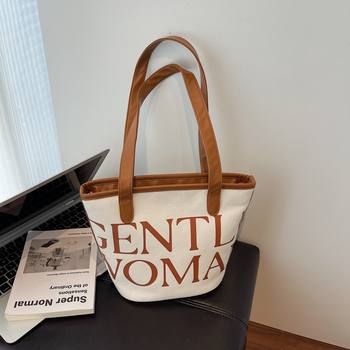 Platnena torba-kanta sa zatvaračem, bucket-stil, dvije naramenice, unutarnji džepovi za telefon i dokumente