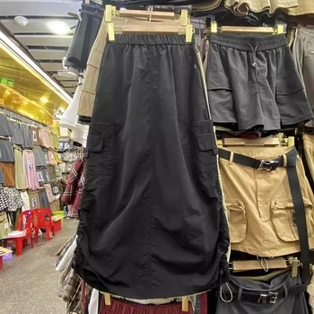 Fustă dreaptă din bumbac, lungă, ușor elastică.