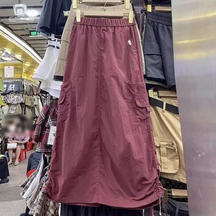 Fustă dreaptă din bumbac, lungă, ușor elastică.