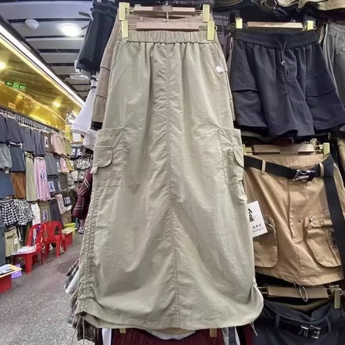 Fustă dreaptă din bumbac, lungă, ușor elastică.