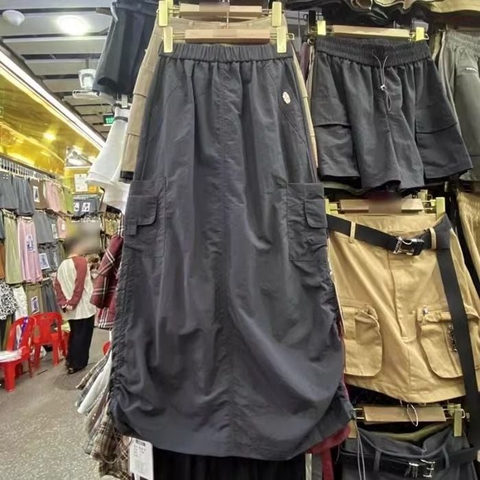 Fustă dreaptă din bumbac, lungă, ușor elastică.