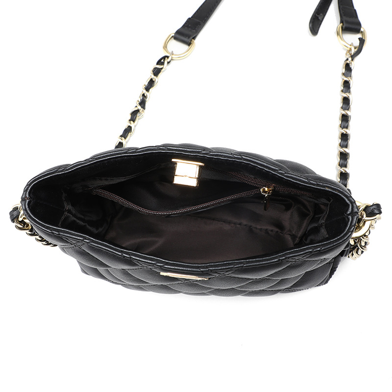 Ženska crossbody torbica od prave kože s detaljima od sintetičke kože; horizontalni kvadratni oblik; zaključavanje lokotom; unutarnja džep s zipom; jedna Naramenica