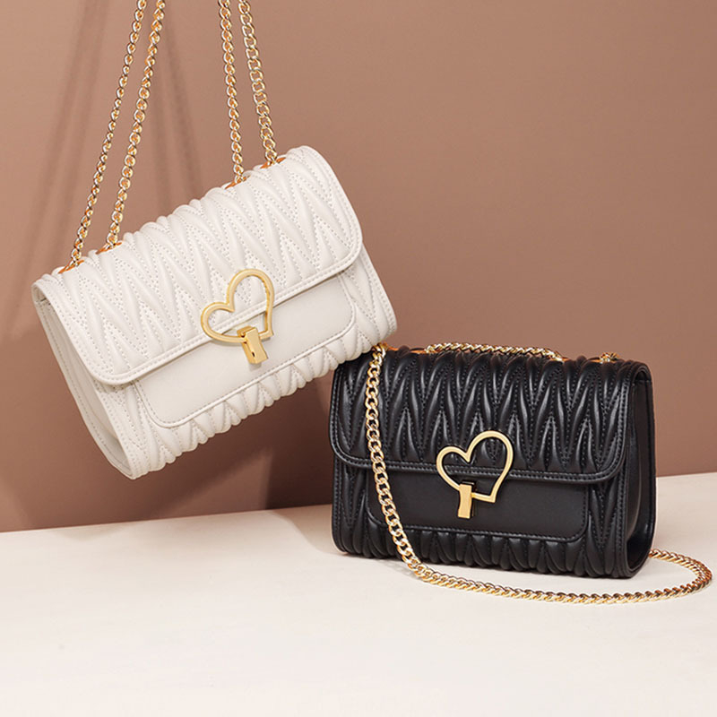 Női utcai stílusú valódi bőr bucket táska fedős zárással, belső rekeszekkel