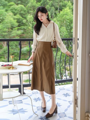 Φούστα PU δέρμα με Α-γραμμή, ψηλόμεση, midi μήκος, πάνελ ραφές, φθινοπωρινή-χειμερινή