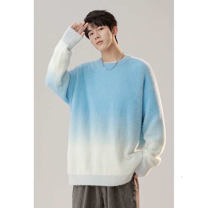 Πλεκτό πουλόβερ σε άνετη γραμμή, στρογγυλός λαιμός, μακριά μανίκια και μοτίβο ζακάρ