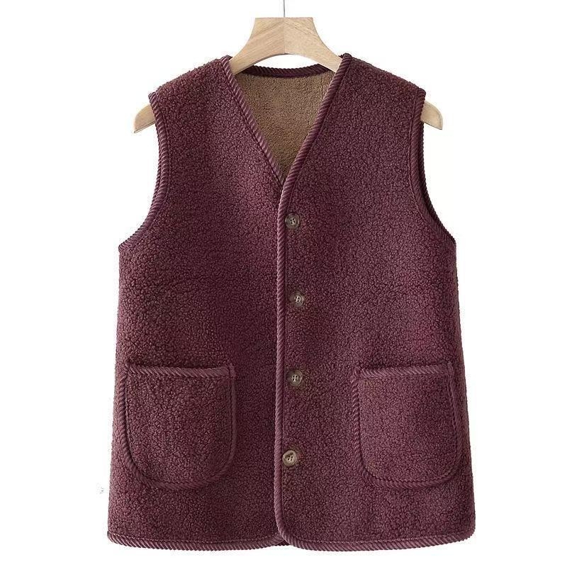Vesta s flis podstavom, bez ovratnika, duljina 50-65 cm, acetatna tkanina, 90-95% poliester