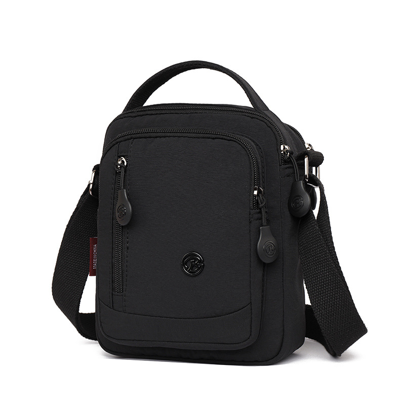 Muška crossbody torba od Oxford materijala, vodootporna i ultra lagana, s višestrukim pretincima za rekreacijska putovanja