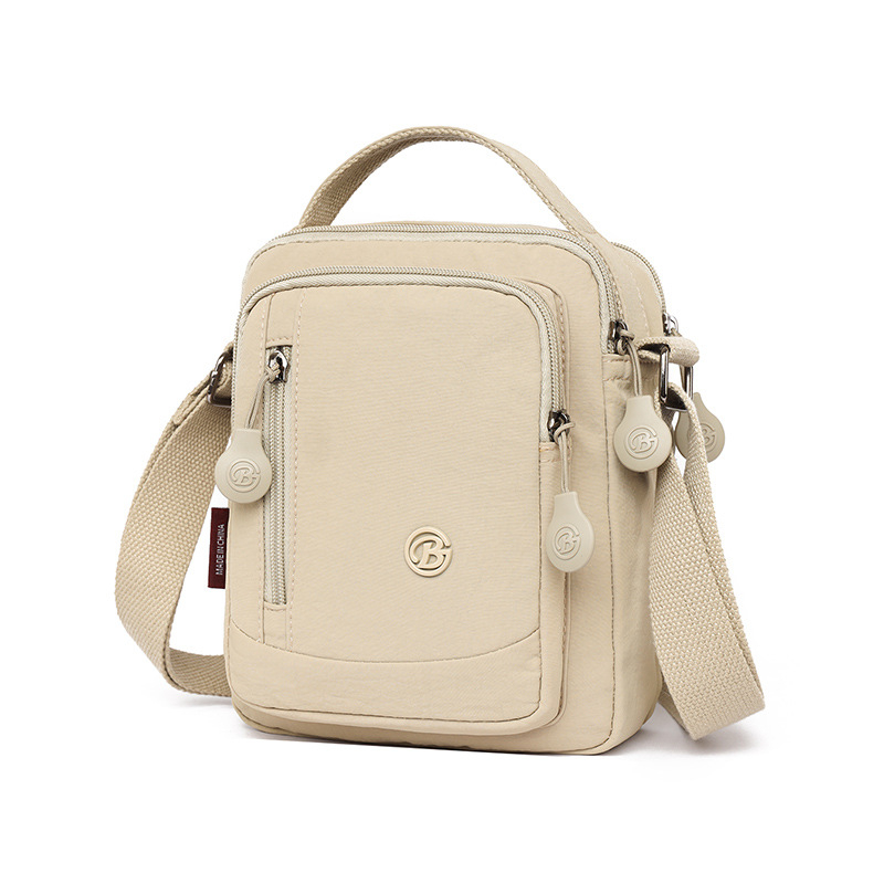 Muška crossbody torba od Oxford materijala, vodootporna i ultra lagana, s višestrukim pretincima za rekreacijska putovanja