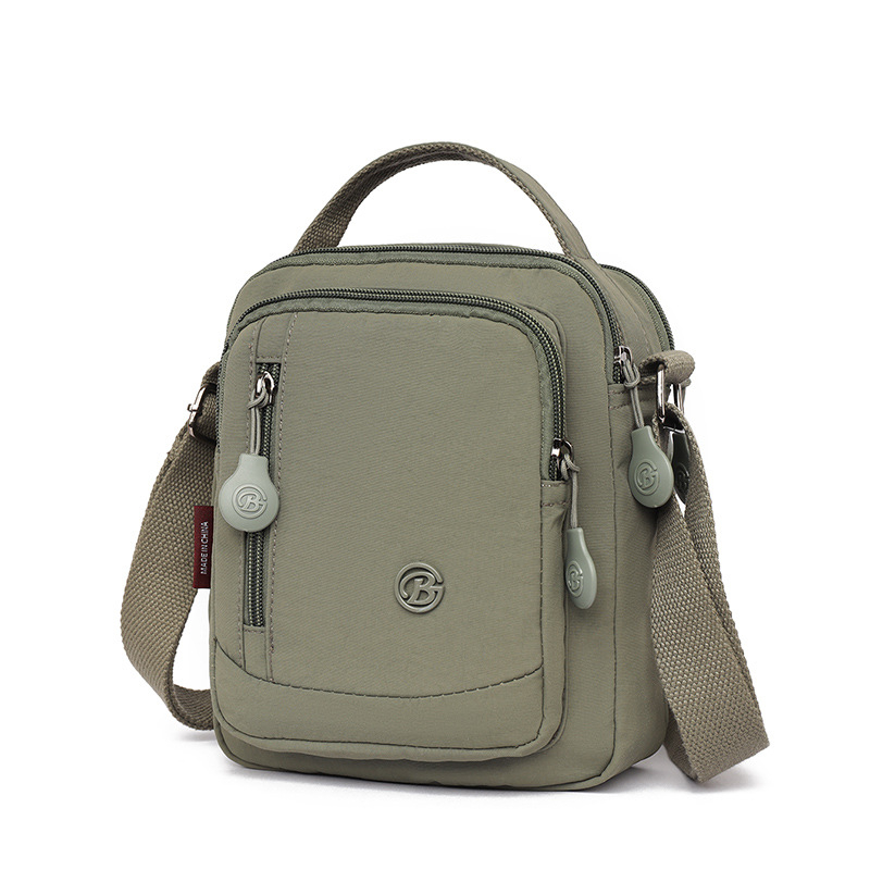 Muška crossbody torba od Oxford materijala, vodootporna i ultra lagana, s višestrukim pretincima za rekreacijska putovanja