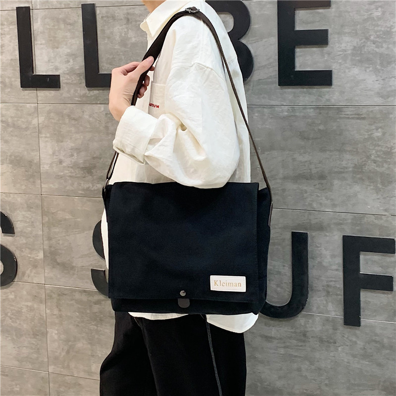 Muška platnena crossbody torba, japanskog stila, proširivi dizajn, pogodna za 8-inčni prijenosnik, poliester podstava.