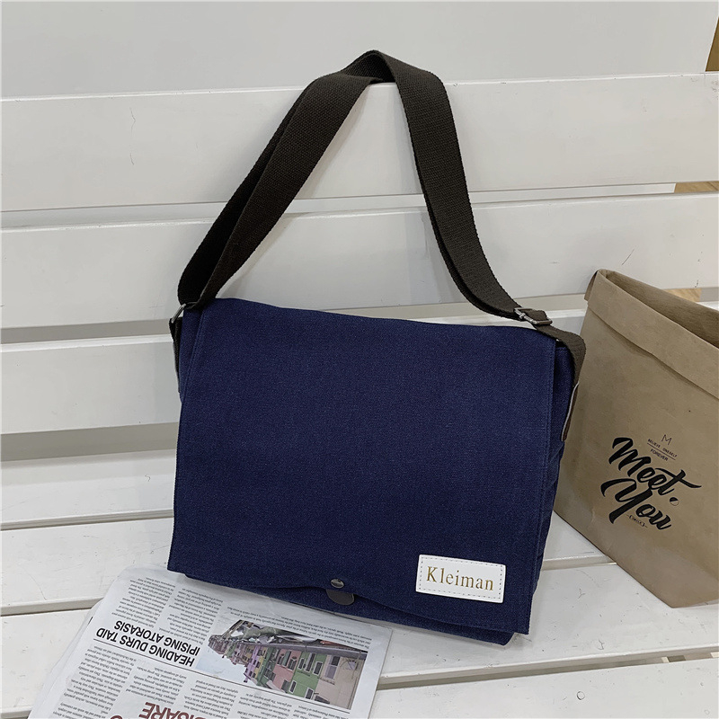 Muška platnena crossbody torba, japanskog stila, proširivi dizajn, pogodna za 8-inčni prijenosnik, poliester podstava.