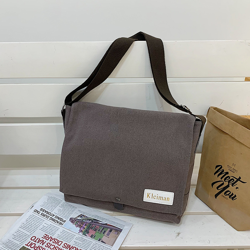 Muška platnena crossbody torba, japanskog stila, proširivi dizajn, pogodna za 8-inčni prijenosnik, poliester podstava.