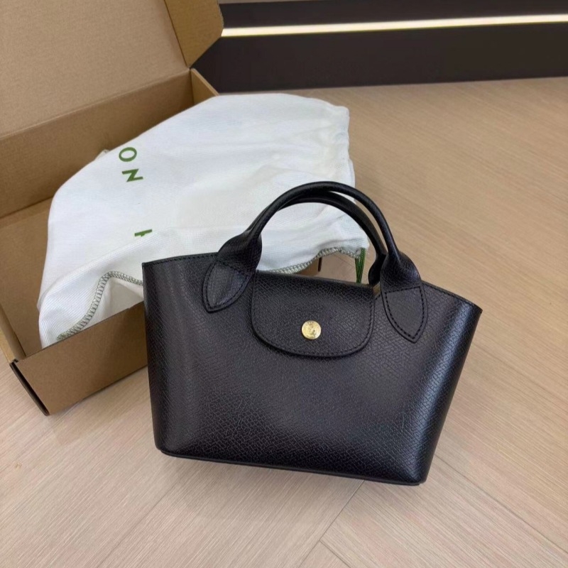 Urban minimalist PU tote torba, dumpling oblik s preklopom, platnena podstava, unutarnji džepovi sa zipom, jedna naramenica, proljeće 2025