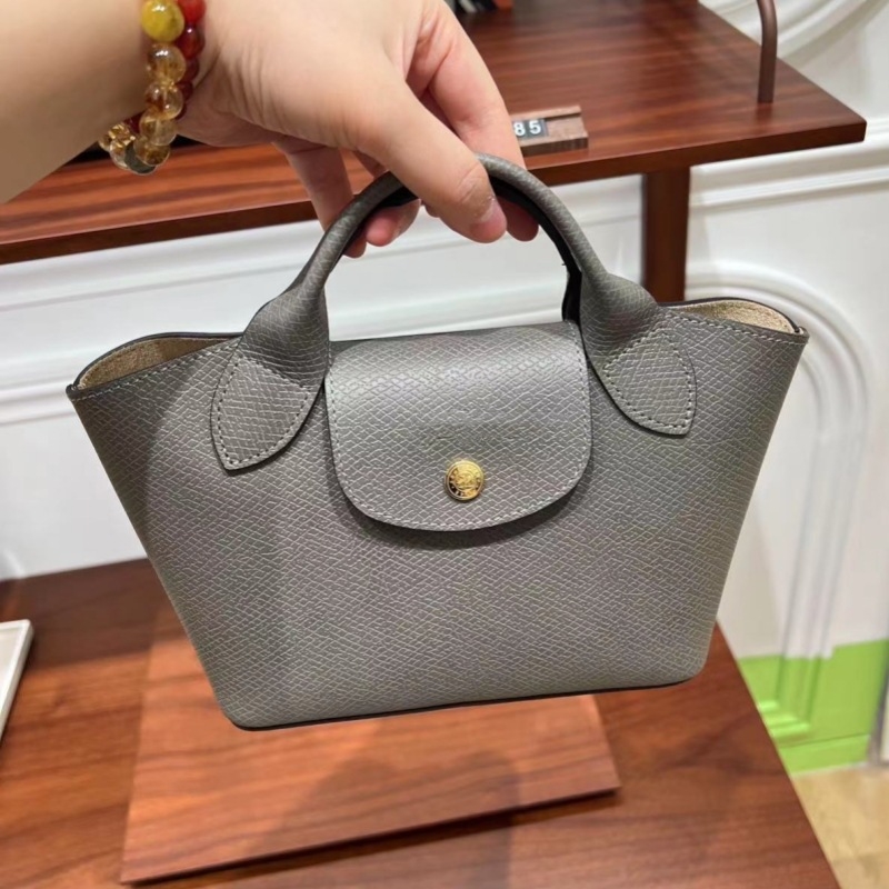 Urban minimalist PU tote torba, dumpling oblik s preklopom, platnena podstava, unutarnji džepovi sa zipom, jedna naramenica, proljeće 2025
