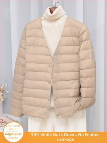 Dámska péřová bunda, štíhla línia, materiál: nylon, výplň: biele kačacie perie, obsah peria 50%, golier typu wood-ear edge