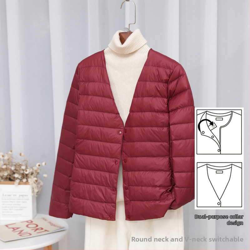 Dámska péřová bunda, štíhla línia, materiál: nylon, výplň: biele kačacie perie, obsah peria 50%, golier typu wood-ear edge