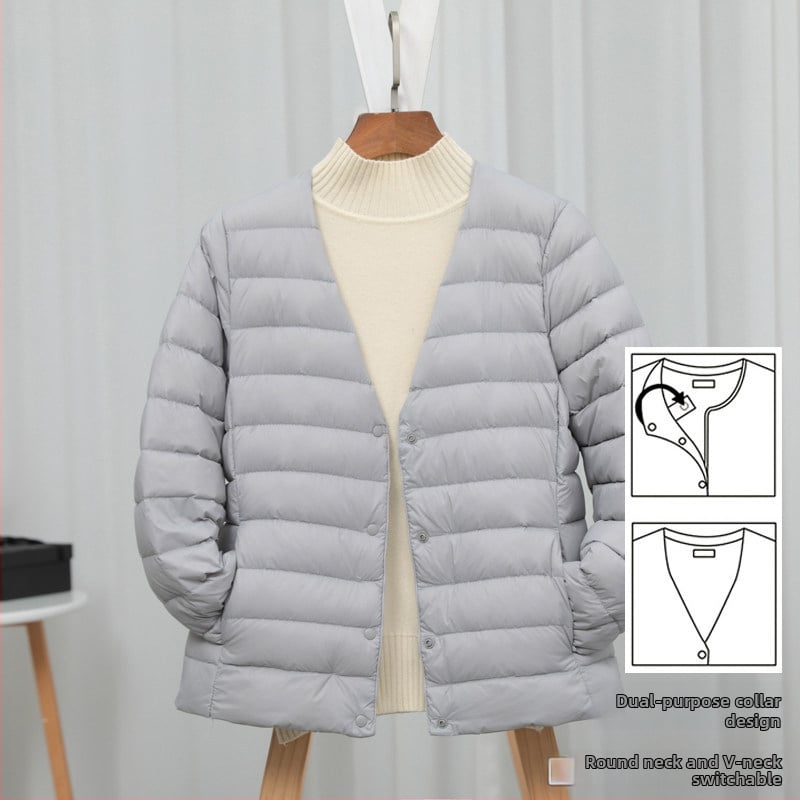 Dámska péřová bunda, štíhla línia, materiál: nylon, výplň: biele kačacie perie, obsah peria 50%, golier typu wood-ear edge