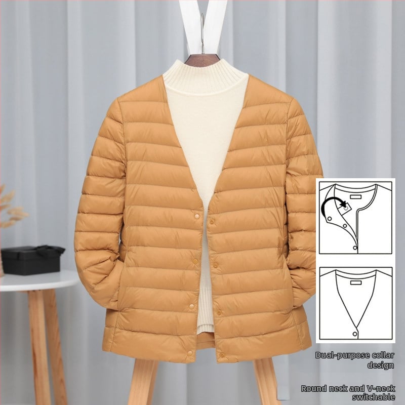 Dámska péřová bunda, štíhla línia, materiál: nylon, výplň: biele kačacie perie, obsah peria 50%, golier typu wood-ear edge