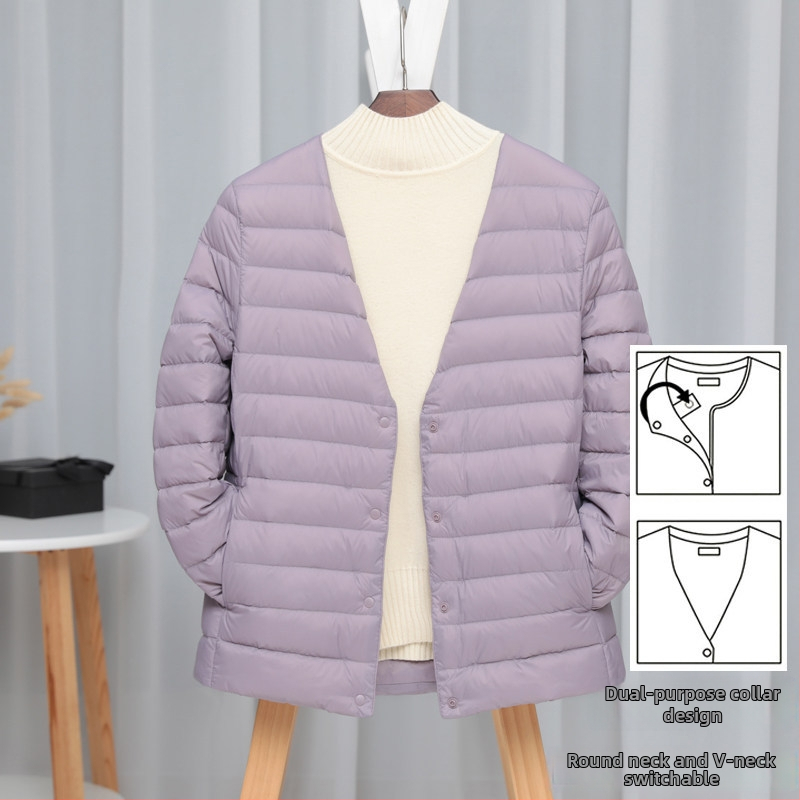 Dámska péřová bunda, štíhla línia, materiál: nylon, výplň: biele kačacie perie, obsah peria 50%, golier typu wood-ear edge