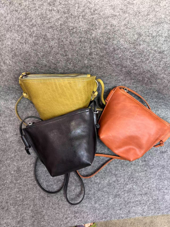 Dámska crossbody kabelka, ručne vyrobená z vrchnej vrstvy hovädzej kože, oválny tvar, zapínanie na zips, mestský trend