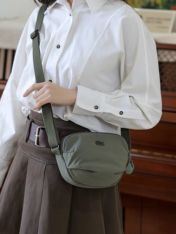 Ženska crossbody torba od Oxford platna, nylon podstava, zatvaranje na zip, unutarnja džep s zipom, trodimenzionalni dizajn