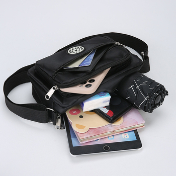 Crossbody torba od Oxford platna, kompaktna kvadratna forma, sa zatvaračem i pretincima za telefon i dokumente