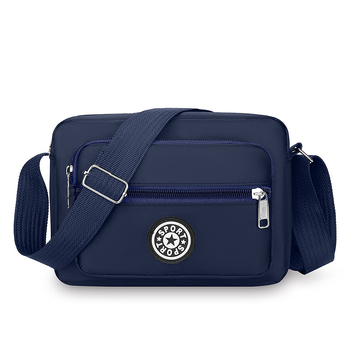Crossbody torba od Oxford platna, kompaktna kvadratna forma, sa zatvaračem i pretincima za telefon i dokumente