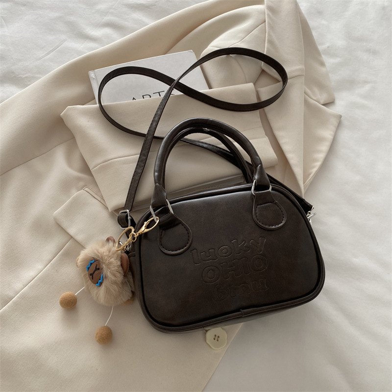 Ženska torbica preko ramena u korejskom stilu, retro street fashion, mini kvadratni oblik, PU materijal, vodoravni kvadratni oblik, zip zatvarač, podstava poliester