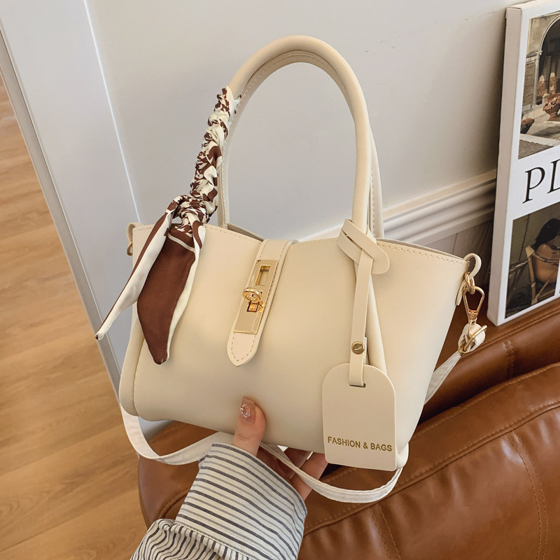 Geantă bucket în stil street, material PU, închidere cu lacăt, buzunar intern pentru telefon, vara 2025