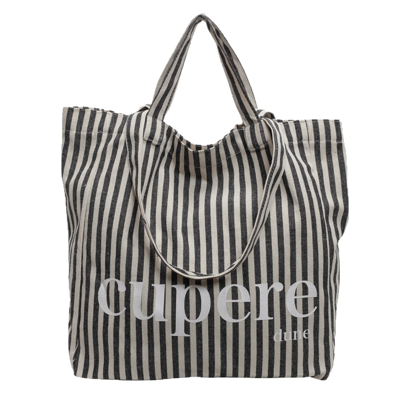 Geantă tote din canvas, stil street-trend, închidere cu lacăt, căptușeală din poliester, curele de umăr duble