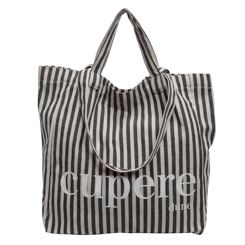 Geantă tote din canvas, stil street-trend, închidere cu lacăt, căptușeală din poliester, curele de umăr duble