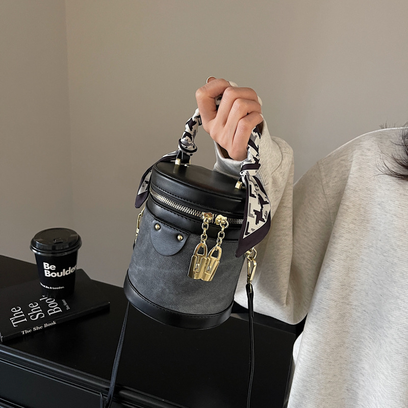 Bucket bag za žene – gradski minimalistički stil, PU koža, poliester podstava, zatvarač