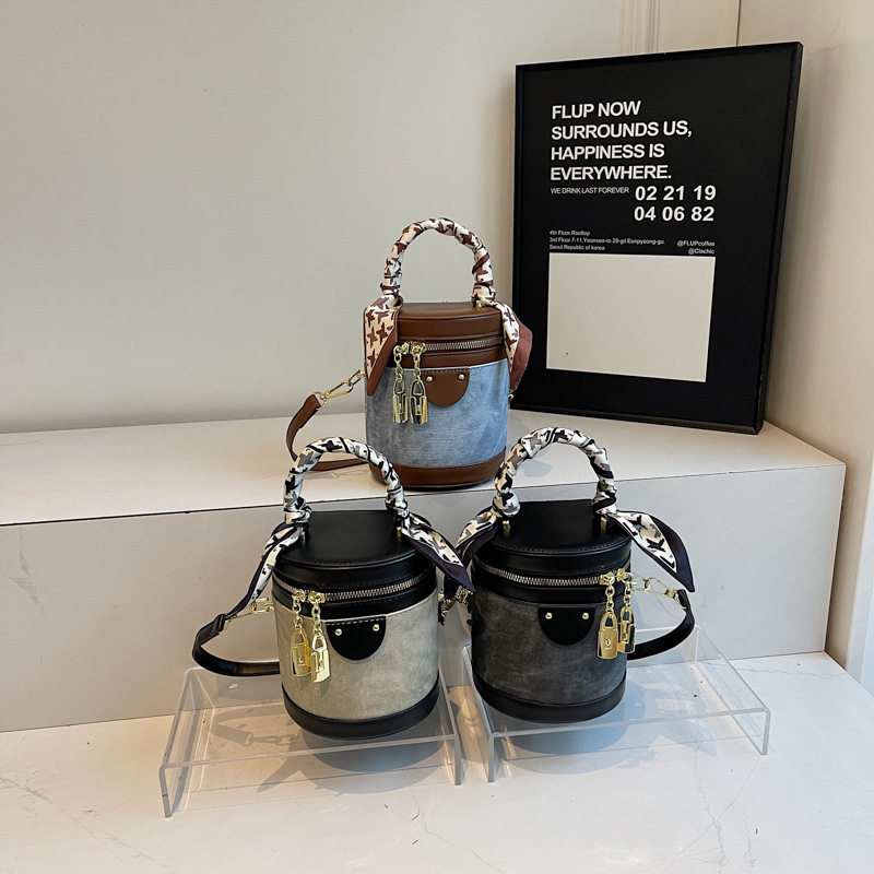 Bucket bag za žene – gradski minimalistički stil, PU koža, poliester podstava, zatvarač