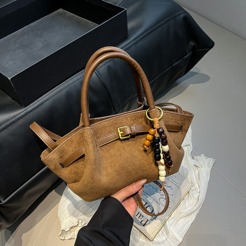 Retro velurska bucket torba sa zatvaranjem na zip i unutarnjim džepom s zipom