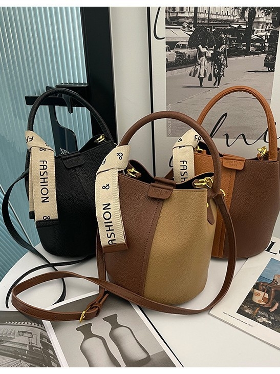 Ženska bucket torba – korejski stil, visoko kvalitetna tekstura (PU materijal; oblik kante; zatvarač; unutarnji džepovi za telefon i dokumente; podstava od poliestera)