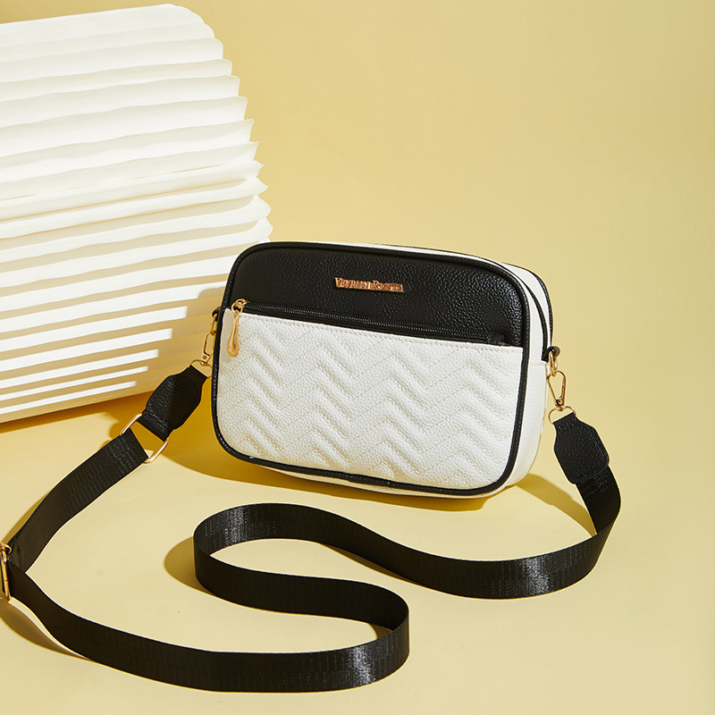 Ženska crossbody torba od PU, horizontalni kvadratni oblik, zatvarač, unutarnji džepovi za telefon i ID, gradski stil jednostavnosti.