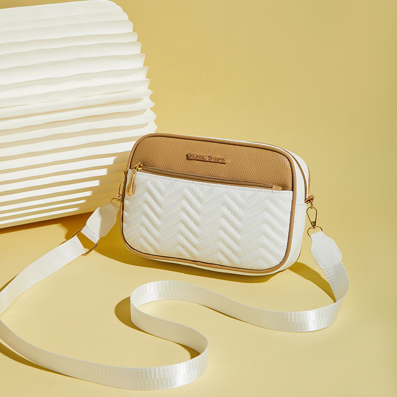 Ženska crossbody torba od PU, horizontalni kvadratni oblik, zatvarač, unutarnji džepovi za telefon i ID, gradski stil jednostavnosti.