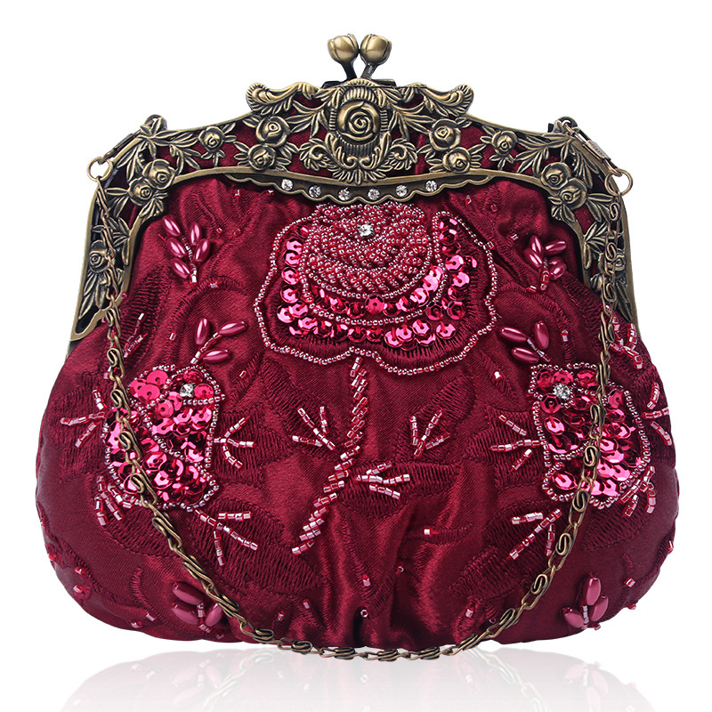 Клатч за вечерно събитие с бродерия от мъниста и флорални мотиви, външен материал: коприна с текстура на найлон, подплата: полиестер, магнитно затваряне, форма дъмплинг, една презрамка